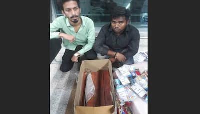 Two passengers apprehended at Delhi airport for carrying 43 kg red sandalwood