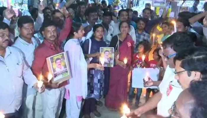 RTC staffs carry out candlelight march in memory of Srinivas Reddy who immolated self 