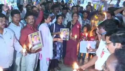 RTC staffs carry out candlelight march in memory of Srinivas Reddy who immolated self 