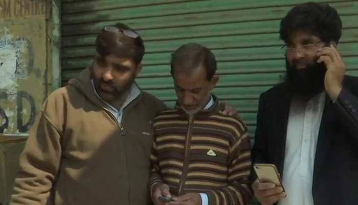Wave of happiness in Kashmir as mobile phones ring after over 70 days in valley