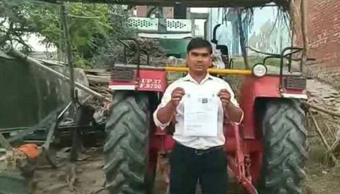 Tractor driver fined Rs 3,000 for driving without helmet, licence in UP's Hapur
