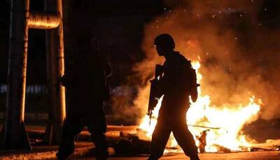 Death toll rises to 11 after weekend of violent protests in Chile