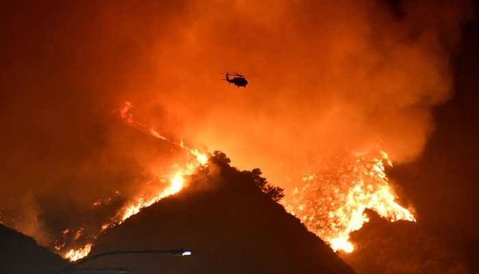 Multimillion-dollar homes burn in Los Angeles wildfire, celebrities flee