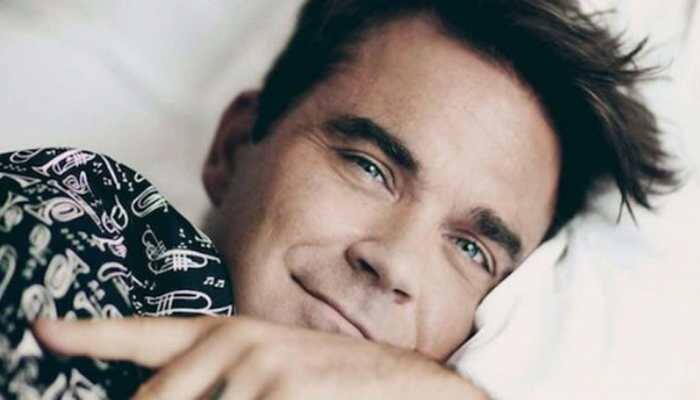Robbie Williams: I'll knock out Liam Gallagher in boxing match