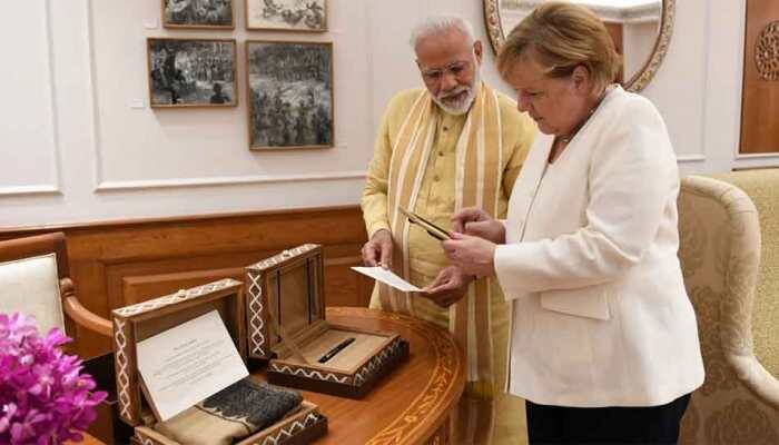 PM Narendra Modi gifts Ladakhi woollen khadi stole, Ratnam pen to Angela Merkel