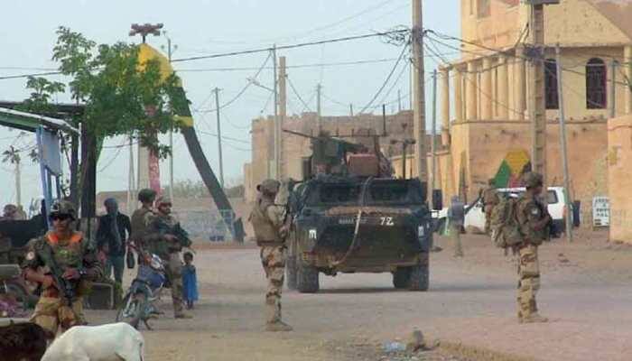 Militants kill 54 in attack on Mali army post, Islamic State claims responsibility