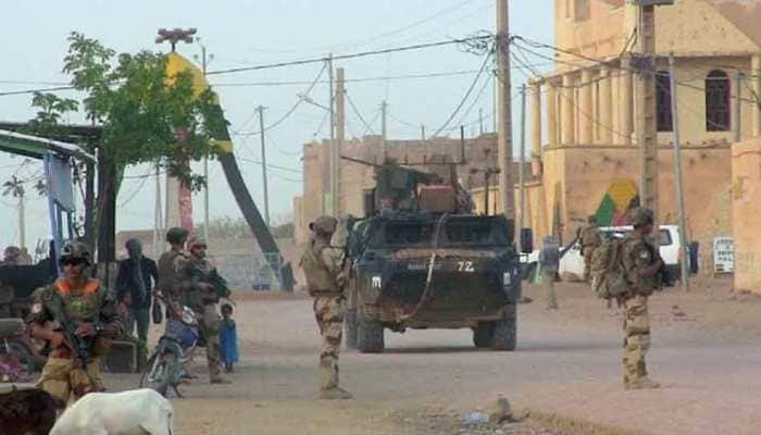 Militants kill 54 in attack on Mali army post, Islamic State claims responsibility