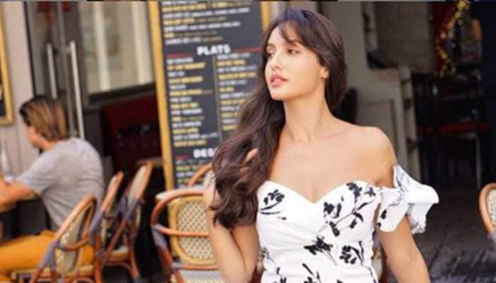 Nora Fatehi mesmerises in a floral dress with a thigh-high slit—Pics