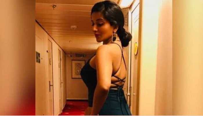 Monalisa stands tall in a racer back gown, shares pics on social media