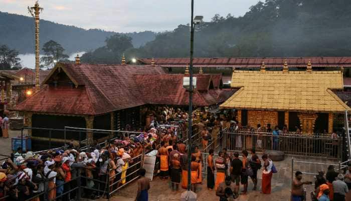 Sabarimala Temple opens amid tight security arrangements, 10 women devotees stopped in Pamba