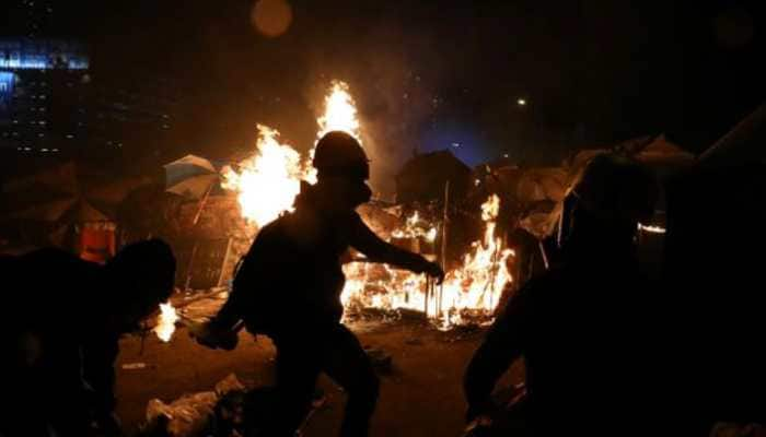 Hong Kong campus protesters fire arrows as unrest spreads across Kowloon