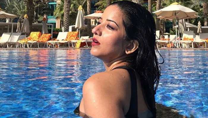 Monalisa oozes oomph in a black bikini, enjoys her swim time—See pics