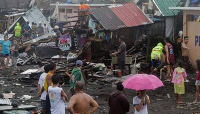 One killed as Typhoon Kammuri hits the Philippines, hundreds of flights halted