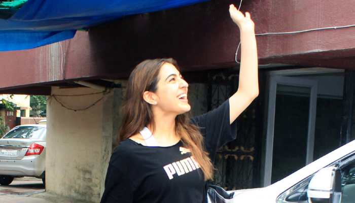 Sara Ali Khan flashes her million-dollar smile as paps click her at gym – Photos
