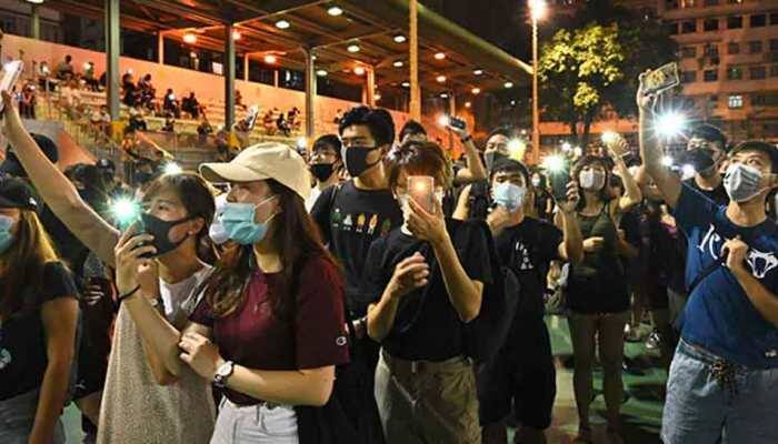 Peaceful Hong Kong march marred by fire outside court, police say