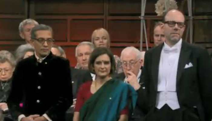 Dressed in dhoti and sari, Abhijit Banerjee, Esther Duflo receive Nobel Prize in Economics