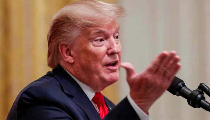 President Donald Trump accuses Democrats of 'attempted coup' on eve of impeachment vote