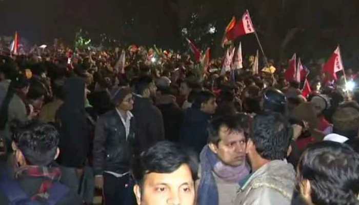 JNU students block police flag march, shout &#039;Delhi Police, go back&#039; after violence in varsity campus - WATCH  