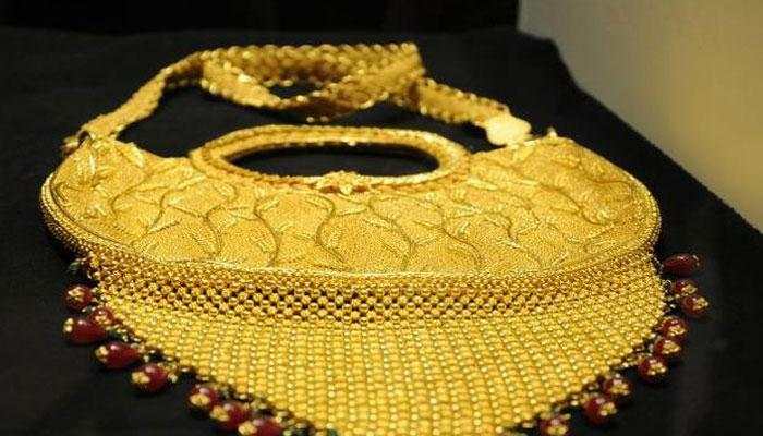 Gold prices down from near 7-year high as US-Iran tensions ease
