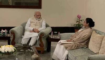PM Narendra Modi meets Mamata Banerjee at Raj Bhavan; TMC, Left activists continue protests