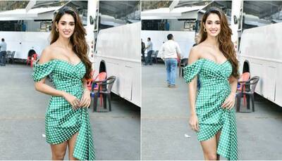 Disha Patani makes spotlight follow her in a green off-shoulder dress with plunging neckline. See pics