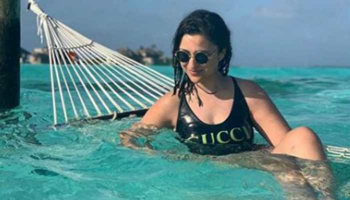 Parineeti Chopra turns water baby in Maldives, shares breathtaking pics |  People News | Zee News
