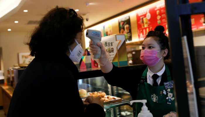 China seeks to boost economy as first coronavirus death reported outside its borders China seeks to boost economy as first coronavirus death reported outside its borders