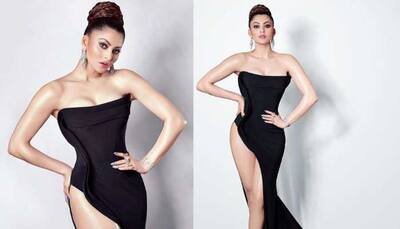 Urvashi Rautela ups the hotness quotient in a black thigh-high slit gown – Pics