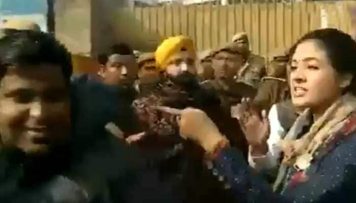 Caught On cameras: Congress&#039; Alka Lamba tries to slap AAP cadre at polling booth