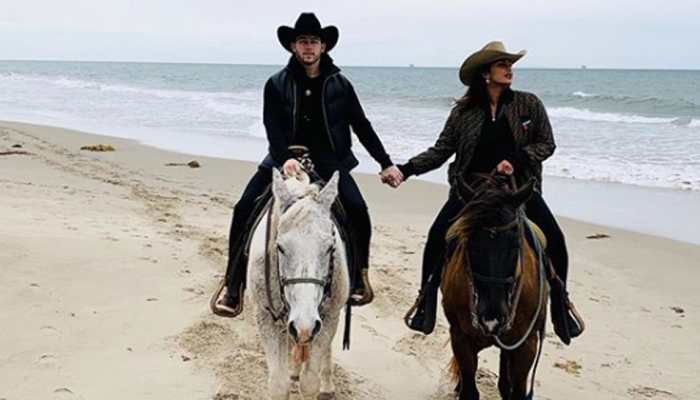 Priyanka Chopra-Nick Jonas wear cowboy hats, hold hands and enjoy horse ride on a beach - In Pics