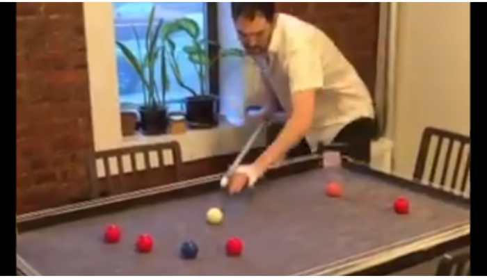 Coronavirus COVID-19: Man locked down in his house converts dining table into pool table; watch here