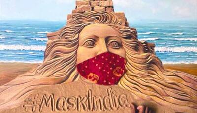 Sand artist Sudarsan Pattnaik urges people to make masks at home through his breathtaking creation