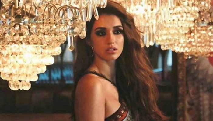 Disha Patani dolls-up in a corset top, denims and boots only to sit in her living room - Pic proof