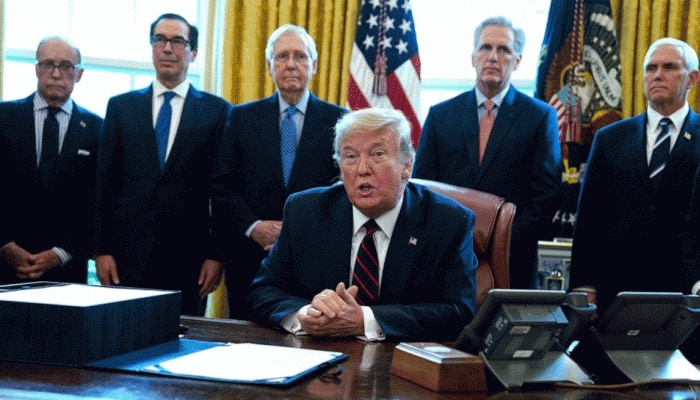 Donald Trump signs executive order temporarily suspending immigration into US for 60 days amid COVID-19 pandemic