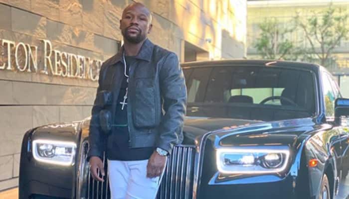 A look at boxing great Floyd Mayweather&#39;s insane black and white £20million  car collection | Other Sports News | Zee News