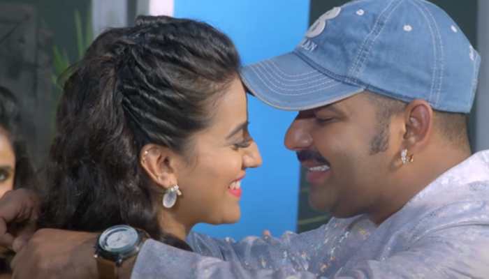 Pawan Singh and Akshara Singh&#039;s romantic Bhojpuri song &#039;Chamkelu Sheeshan Jaisan&#039; goes viral - Watch