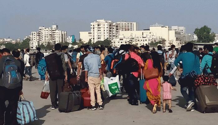 Migrant workers gather at GMDC ground in Ahmedabad, want govt to send them home