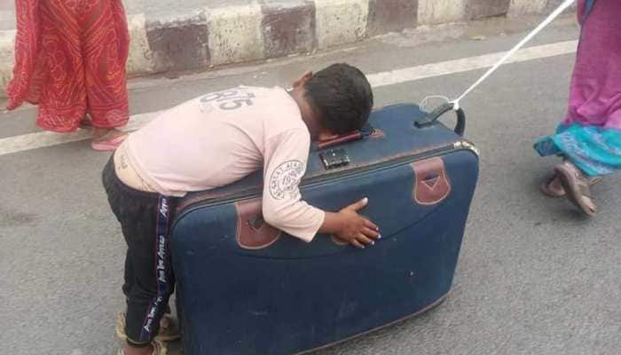 NHRC issues notice to Punjab and Uttar Pradesh over migrant mother wheeling suitcase with child sleeping on it
