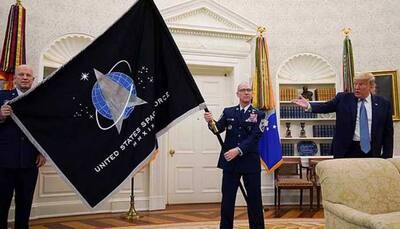 President Donald Trump unveils Space Force flag, claims US military will build 'super duper missile'