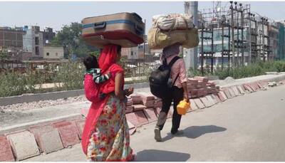 Migrants duped by travel agents in Delhi, woman walks with kid on her back 28 kms in NCR 