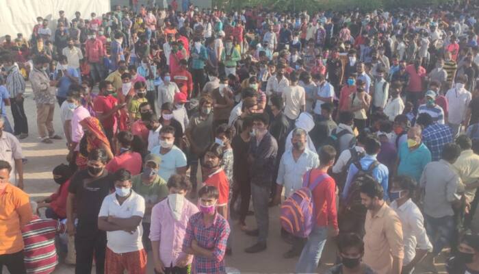 Hundreds of migrant workers gather in Ahmedabad to leave for Bihar