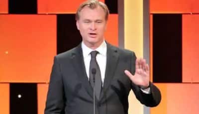 Christopher Nolan's promise to fans: 'Tenet' is 'coming to theatres'