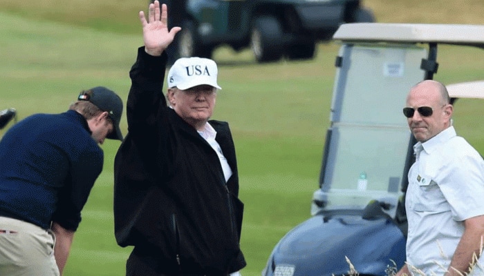 Donald Trump plays golf as coronavirus deaths inch closer to 1 lakh in US