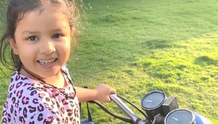 Ziva Dhoni loves to ride a bike like daddy cool MS Dhoni, goes &#039;vroom vroom&#039; in this viral video - Watch 