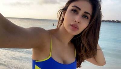 Entertainment News: Mouni Roy's post-dance pics raises the mercury as she flaunts her washboard abs!