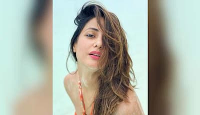 Hina Khan raises the temperature in orange floral bikini in throwback to ‘beach love’ post
