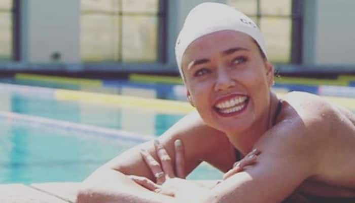 Former Olympic swimmer Natalie Coughlin, husband Ethan Hall expecting second baby