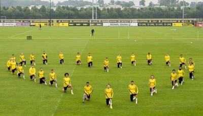 Borussia Dortmund, Hertha Berlin players kneel in tribute to George Floyd during Bundesliga tie
