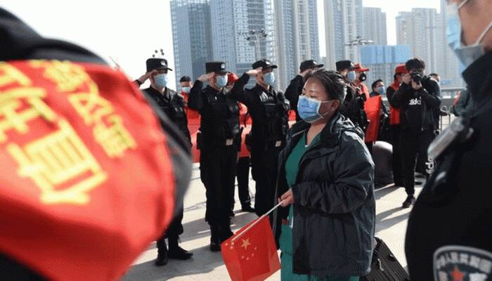 Beijing puts fresh curbs to stop spread of coronavirus out of Chinese capital