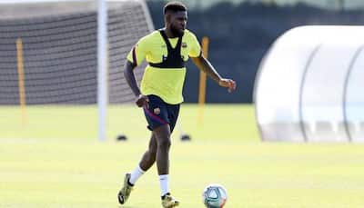 Barcelona defender Samuel Umtiti sidelined with knee injury 
